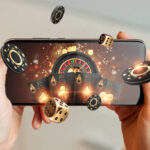 creative-background-online-casino-in-a-mans-hand-a-smartphone-with-playing-cards-roulette-and